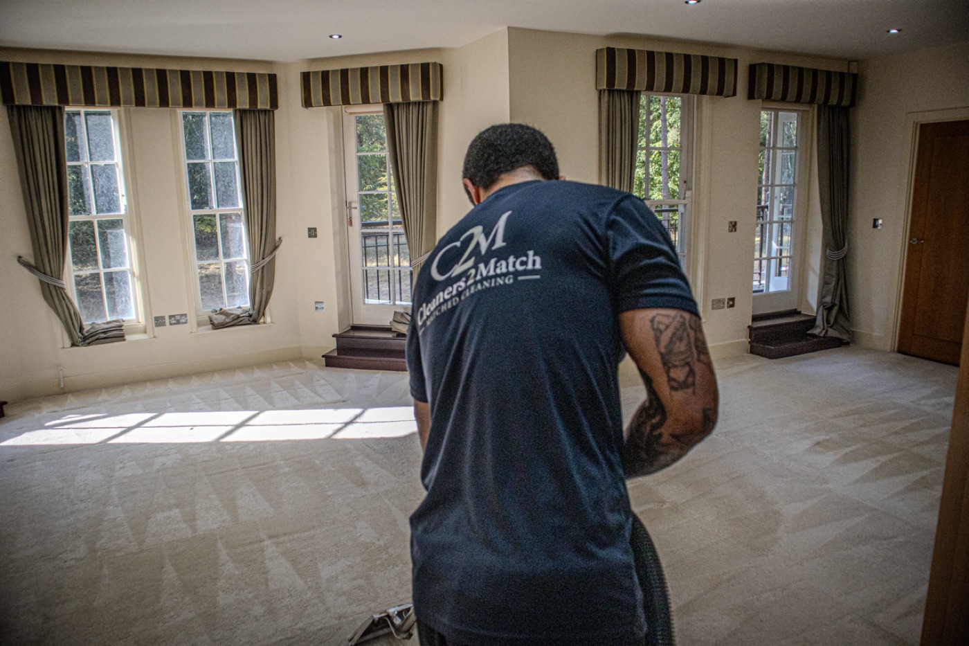 Cleaners2Match technician deep cleaning carpet in a South East London home