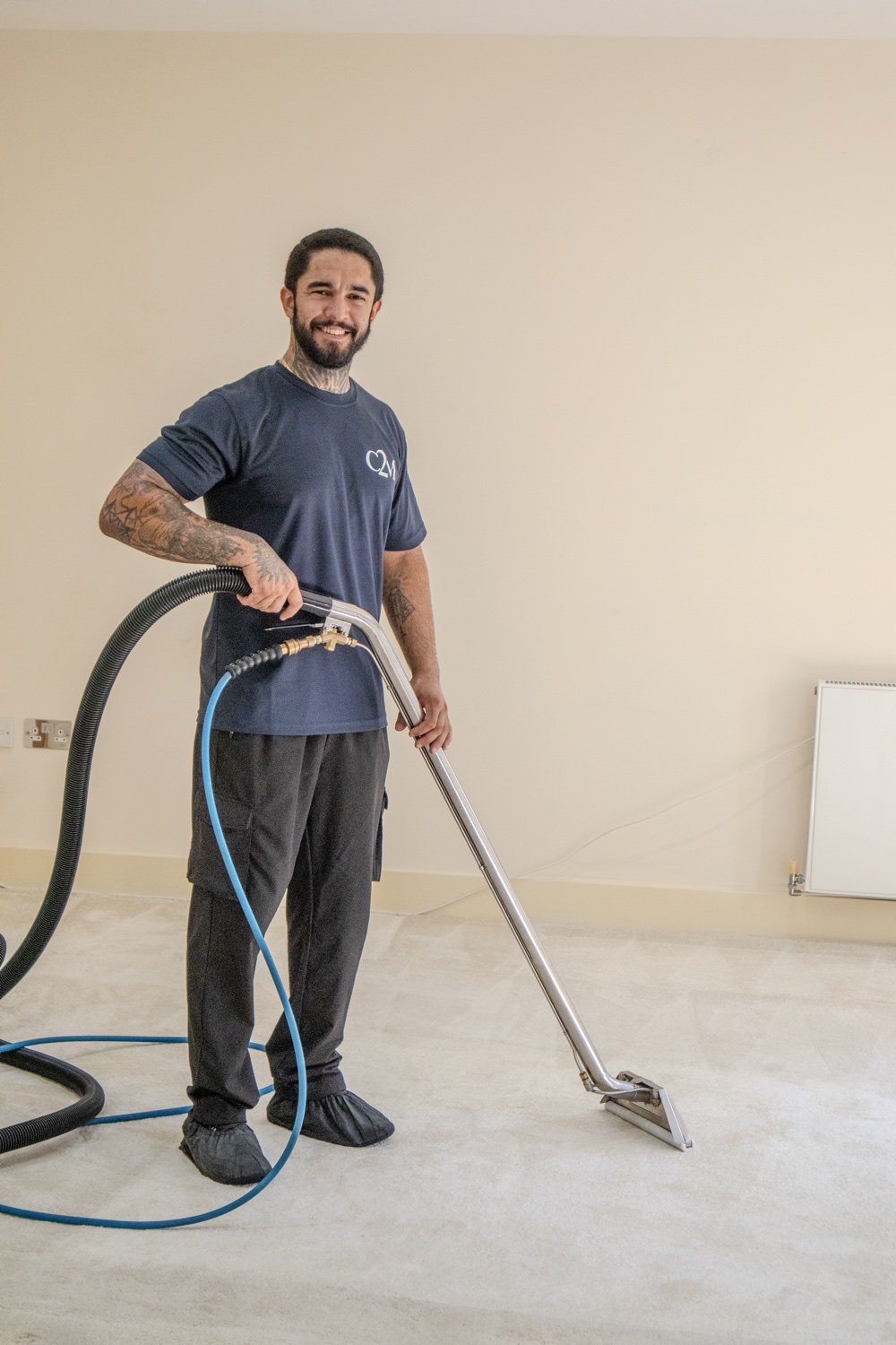 Cleaners2Match technician deep cleaning a carpet with hot water extraction in Bromley